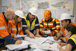 AI in Mining Data Foundations Robot Participating in Meeting
